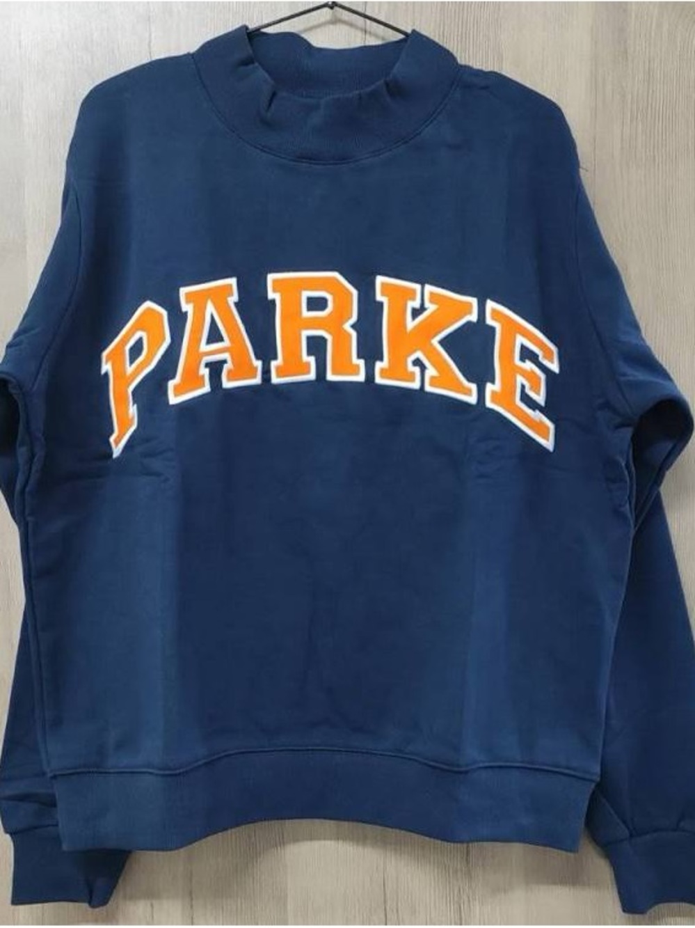 PARKE Navy Sweatshirt with Orange Lettering